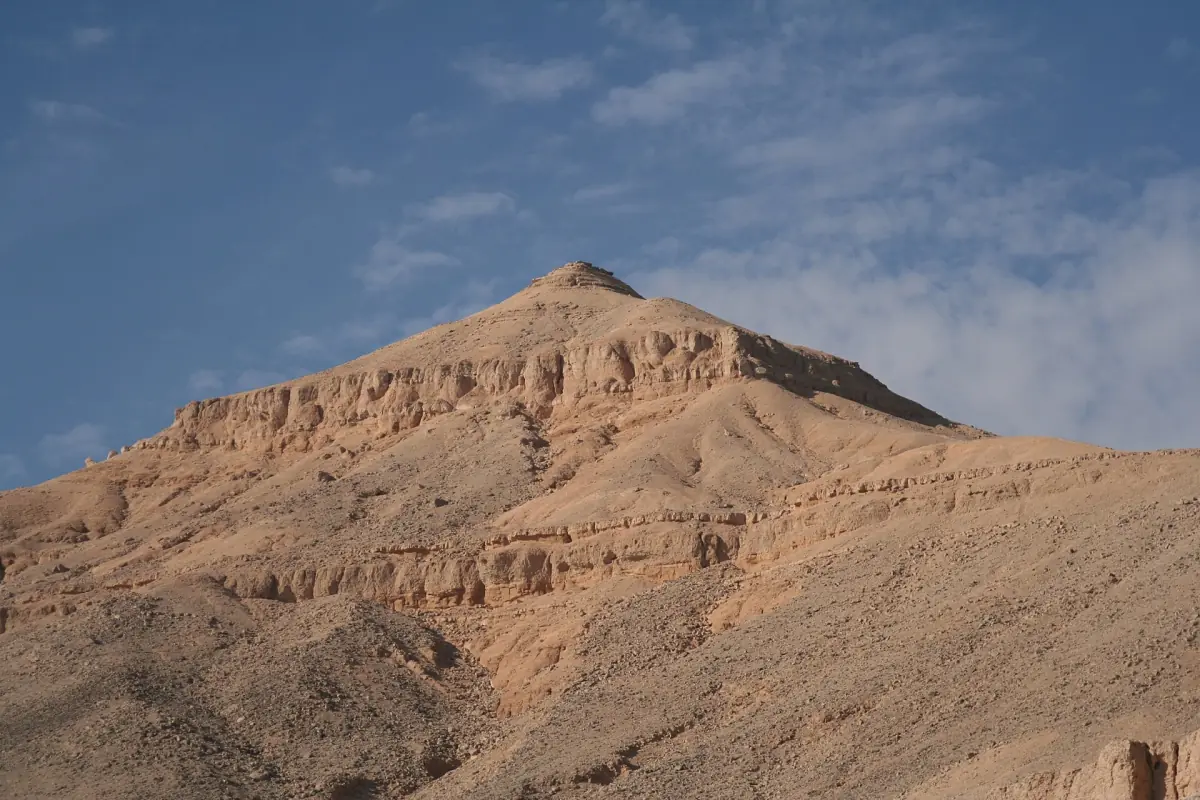 The pyramid-shaped peak of el-Qurn